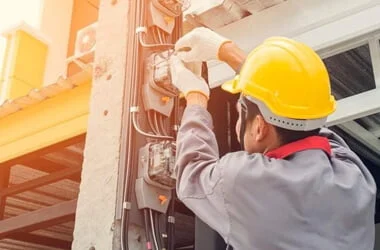 man working with cables